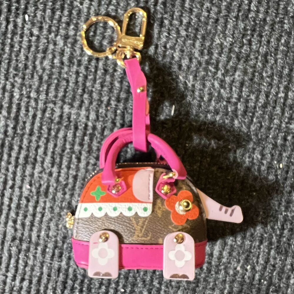 Pre-Owned Louis Vuitton Monogram Coated Canvas Wild Puppet Elephant Bag Charm